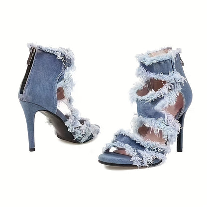 Denim high-heeled sandals with frayed edges on a white background