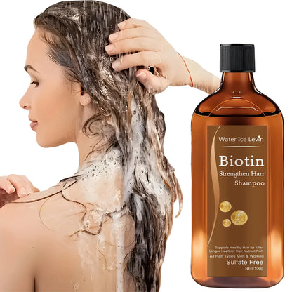 Woman washing hair with a bottle of Biotin Strengthen Hair Shampoo on a white background